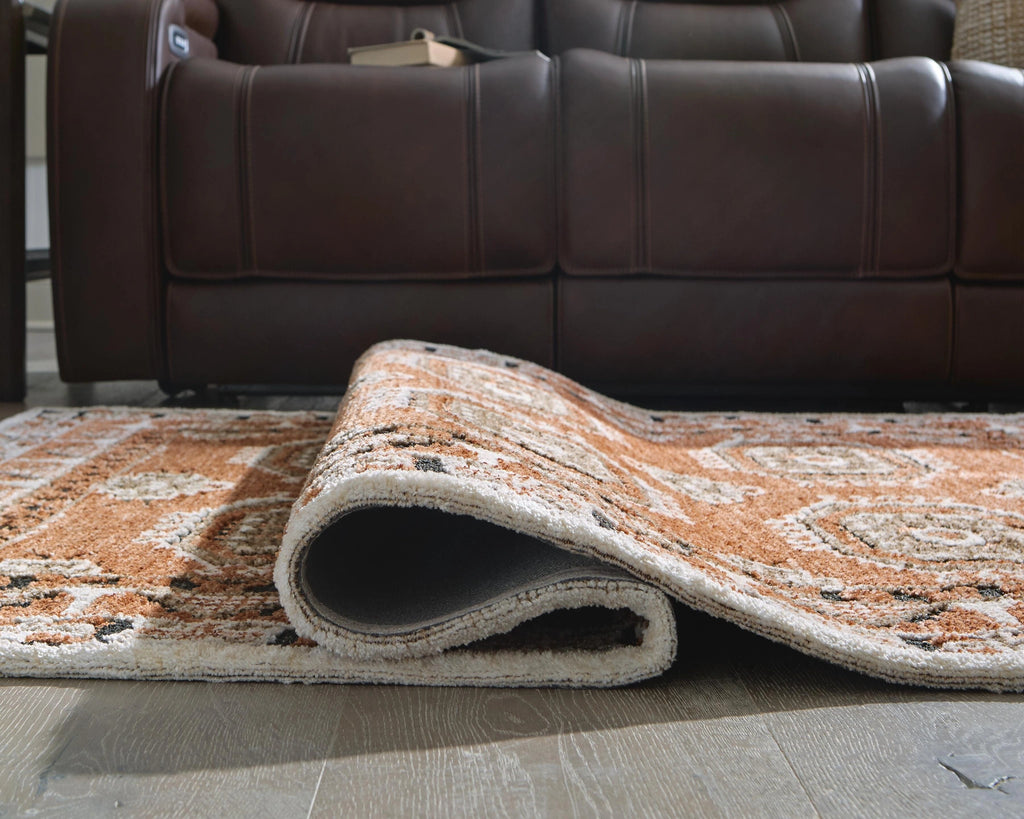 Qaabiz Area Rug