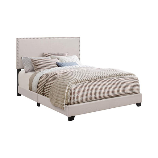Boyd Eastern King Upholstered Bed with Nailhead Trim Ivory - VIP FURNITURE (NJ)
